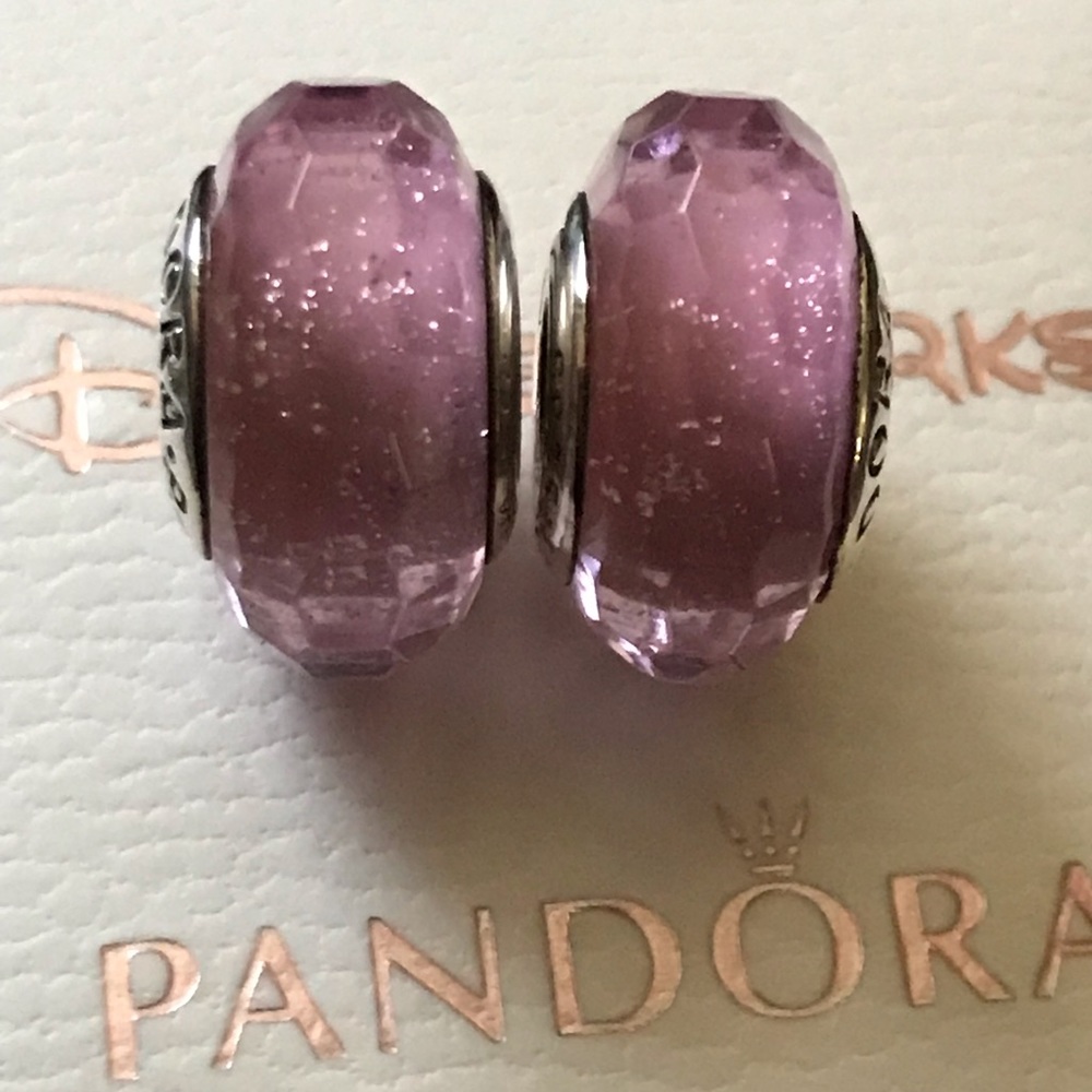 2 pink charms